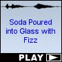 Soda Poured into Glass with Fizz