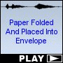Paper Folded And Placed Into Envelope