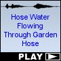 Hose Water Flowing Through Garden Hose