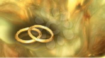 Royalty Free Video of Rotating Wedding Rings With a Gold Shimmery Background
