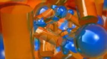Royalty Free Video of Rotating Blue Balls and Orange Cylinders